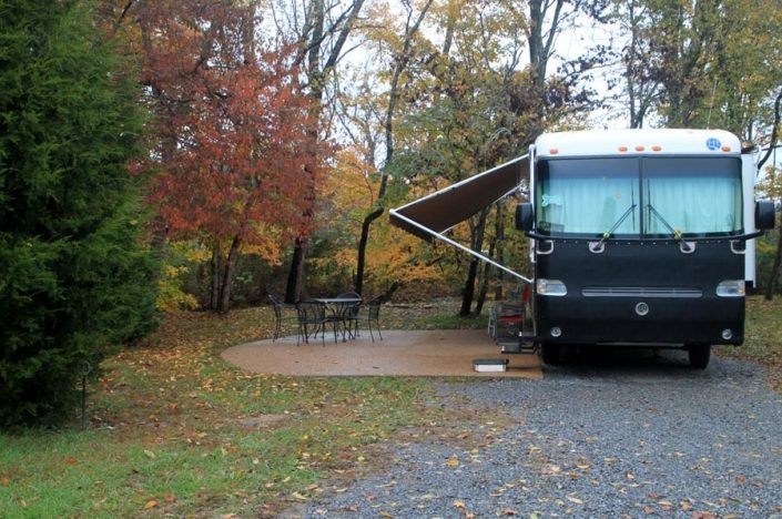 camper-beside-concrete-patio